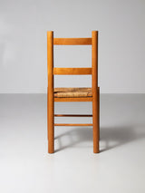 Juego de ocho sillas de haya y enea