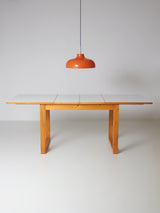 Mesa extensible de pino y fórmica