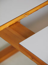 Mesa extensible de pino y fórmica