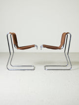 Cadires Cantilever de tub cromat i lona