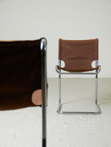 Cadires Cantilever de tub cromat i lona