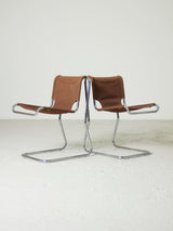 Cadires Cantilever de tub cromat i lona