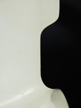 Cadira de plàstic blanca