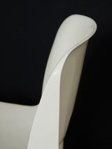 Cadira de plàstic blanca