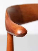 Juego de cuatro sillas de madera y piel