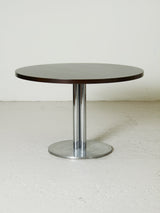 Mesa de comedor redonda de hierro y madera