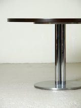 Mesa de comedor redonda de hierro y madera