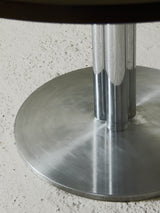 Mesa de comedor redonda de hierro y madera