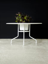 Taula rodona de ferro lacat i fibra de vidre