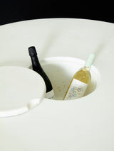 Taula rodona de ferro lacat i fibra de vidre