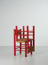 Cadira popular de pi i boga en vermell