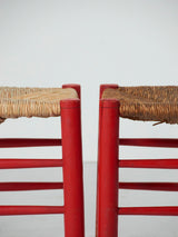 Cadira popular de pi i boga en vermell