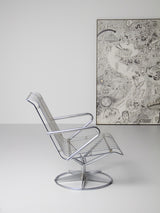 Butaca giratoria d'acer