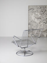 Butaca giratoria d'acer