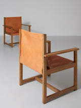 Pareja de sillones de roble y cuero