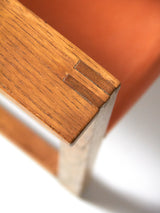 Pareja de sillones de roble y cuero