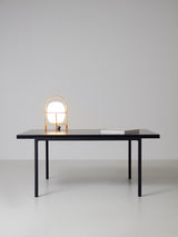 Taula de centre negre de ferro i fusta