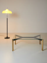 Glass and brass coffee table
