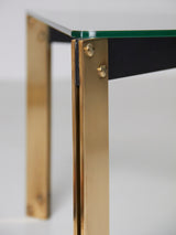 Glass and brass coffee table