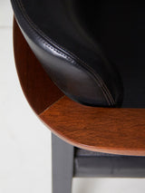 Pareja de sillones de hierro, madera y skay