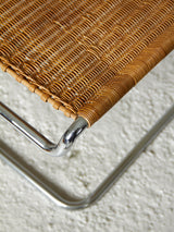 Cantilever chair made of chrome tube and wicker
