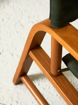 Folding chair made of beech and green canvas