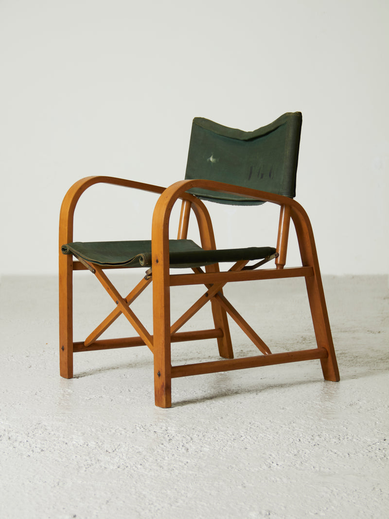 Folding chair made of beech and green canvas