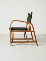 Folding chair made of beech and green canvas