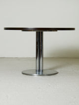 Mesa de comedor redonda de hierro y madera