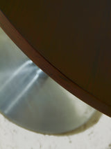 Mesa de comedor redonda de hierro y madera